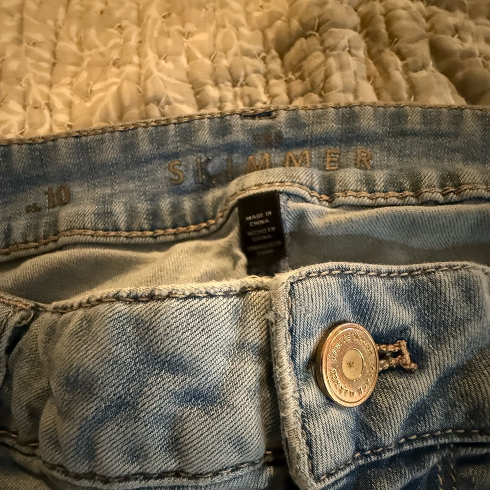 Light Blue Skinny Women's Jeans with Edgy Snap Details at Hem BOHO